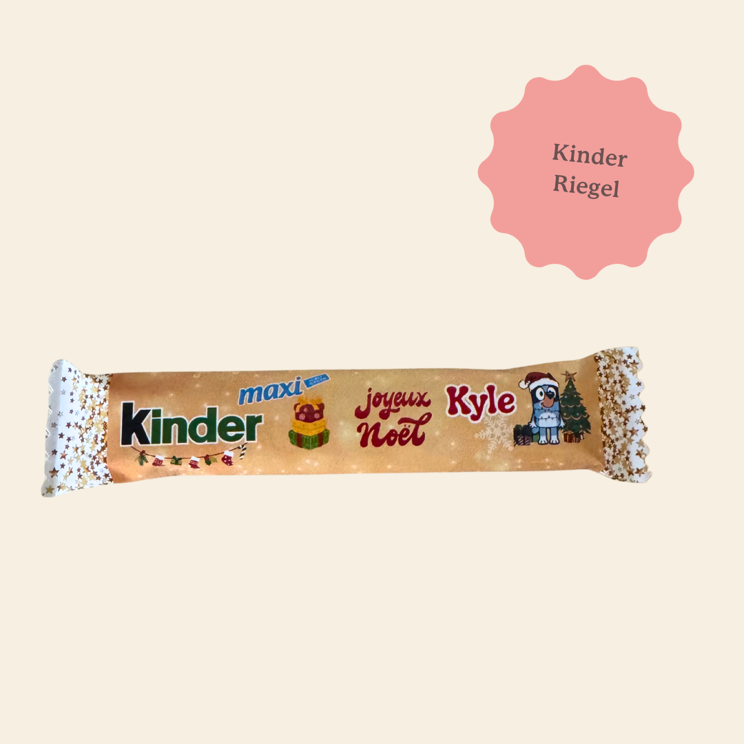 Kinder Riegel Maxi de Noël pour enfant personnalisé avec son prénom et son héro préféré. Bluey, Spiderman, Pat'patrouille, La Reine des neiges, tous les personnages sont possibles. 